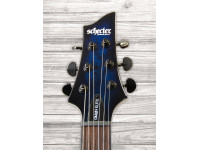 schecter-omen-elite-6-see-thru-blue-burst_6093c7076db20.jpg
